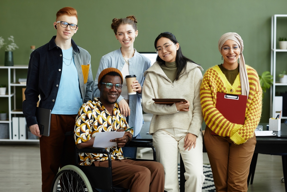 Portrait,Of,Diverse,Creative,Team,Looking,At,Camera,With,Cheerful